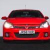 Front close-up of the Vauxhall Astra VXR with headlights illuminated – Redline Competitions