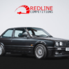 1989 BMW E30 325i Sport in black with MTech II kit, available to win at Redline Competitions