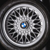 Close-up of alloy wheel on BMW E30 325i Sport