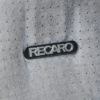 Recaro seat badge close-up on a Ford Capri 2.8i.