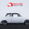 Side profile of 1964 Ford Cortina Cosworth in Jaguar Pearl Grey with GT badges