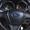 Close-up of Ford Fiesta ST-2 Ecoboost steering wheel with carbon detailing – Redline Competitions