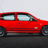 Full side on shot of 2005 Renault Clio Renaultsport Trophy hot hatch in Capsicum Red – Redline Competitions
