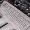 Close-up of Renault Sport engine cover in 2005 Renault Clio Renaultsport Trophy hot hatch – Redline Competitions