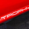Close-up of “Trophy” branding on side skirt of 2005 Renault Clio Renaultsport Trophy hot hatch – Redline Competitions
