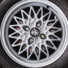 Close-up of cross-spoke alloy wheel on 1990 Vauxhall Astra GTE Champion Edition – Redline Competitions