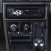 Close-up of central dashboard controls in 1990 Vauxhall Astra GTE Champion Edition – Redline Competitions