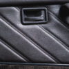 Close-up of black Connolly leather on door card of 1990 Vauxhall Astra GTE Champion Edition – Redline Competitions