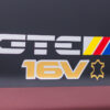 Close-up of coloured GTE 16V badge on 1990 Vauxhall Astra GTE Champion Edition – Redline Competitions