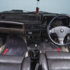 Wide interior shot of Mk2 Vauxhall Astra GTE Champion Edition showing dashboard and seats – Redline Competitions