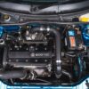 Full engine bay of the Vauxhall Corsa B SRI with Z20LEH turbo swap at Redline Competitions