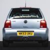 Rear view of a 2003 VW Lupo GTi in silver, part of the Redline Competitions UK car competition.