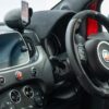 Passenger side interior shot of the Fiat 595 Abarth Competizione showing digital dash and steering wheel. Redline Competitions 9p car draw.