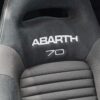 Close-up of Fiat 595 Abarth Competizione 70 year anniversary sports seats. Redline Competitions 9p car competition with instant wins.