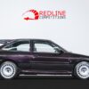 Ford Escort RS Cosworth aubergine side profile with Big Turbo conversion, 18’’ Compomotive alloy wheels, black Recaro interior | Redline Competitions