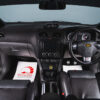 Wide interior view of black Ford Focus ST3 showing steering wheel, gear stick, dashboard and black leather Recaro seats | Redline Competitions