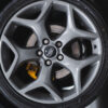 Alloy wheel and yellow brake caliper detail on black Focus ST3.