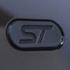 Close-up of ST badge on side of black Ford Focus ST3 | Redline Competitions