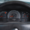 Close-up of Vauxhall Astra GSI dashboard dials and gauges.