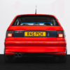 Rear view of red Vauxhall Astra GSI C20LET Turbo with exhaust and GSI badging.