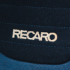Recaro seat logo close-up inside Astra GSI Turbo.