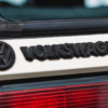 Volkswagen branding badge close-up on rear of 1988 Scirocco Scala.