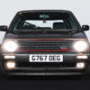 Front of Mk2 Volkswagen Golf GTI Turbo with headlights on, featured in a Redline Competitions giveaway.