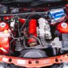 Engine bay of Radiant Red Ford Sierra Sapphire in Redline Competitions UK draw.