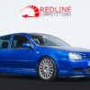 Mk4 Volkswagen Golf R32 in Deep Blue Pearl front side angle – Redline Competitions