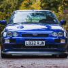Front POV of Ford Escort RS Cosworth showing aggressive stance and detailed front end – Redline Competitions
