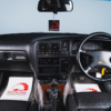 Wide interior view of 1993 Lotus Carlton showing dashboard and steering wheel UK car competition Redline Competitions