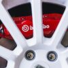 Red Brembo brake caliper on Renault Clio R27 F1 Team Edition