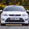 Ford Focus ST front end showing grille, headlights and ST badging from Redline Competitions