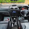 Interior view of Ford Focus ST showing Recaro leather seats and dashboard from Redline Competitions