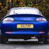Ford Racing Puma rear angle showing exhaust, boot line and arches, Redline Competitions