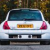 Rear view of the Renault Clio V6 showing the wide body and exhaust