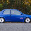 Side profile of the Peugeot 106 Rallye S2 in Indigo Blue available to win via Redline Competitions