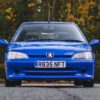 Peugeot 106 Rallye S2 front angle in Indigo Blue available to win via Redline Competitions